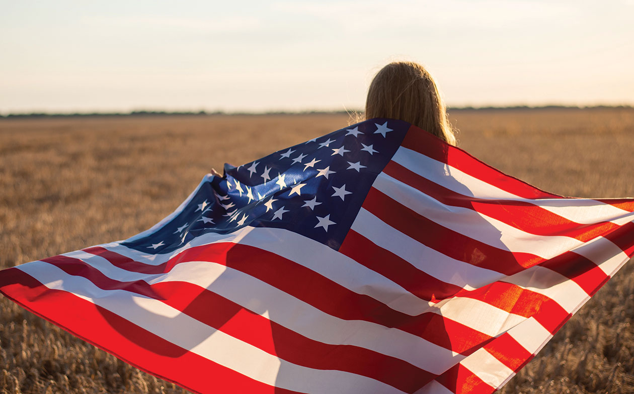 Girl Holding American Flag