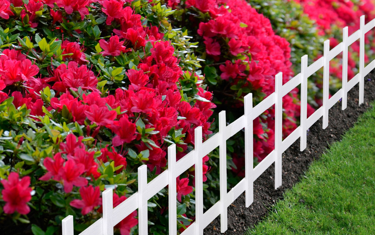 Cape Cod Fence along flower garden