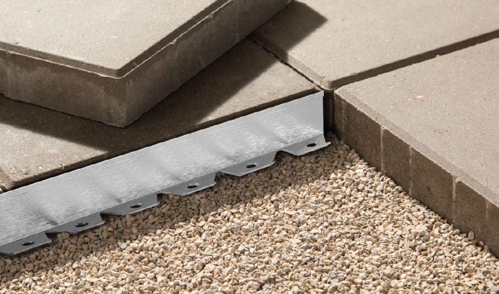Aluminum Paver Edging against large paver bricks