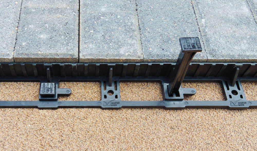 Dig-Free Paver Edging being installed